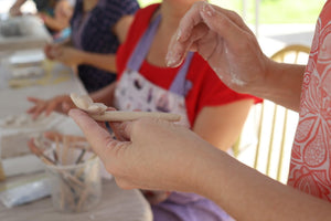 teaching students clay workshop