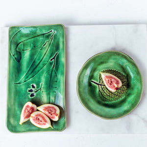 Green Gum, Rectangular Platter & Plate  Perfect for those finger food gatherings, this striking emerald green platter has been thoughtfully designed to accommodate slices of cakes, cheeses, fruits, showcasing Australian botanical designs.  Additionally this side plate is perfect for holding individual servings.  