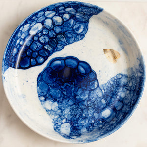 A gorgeous porcelain and cobalt platter is ideal for that special occasion.  These striking platters are large in size with the added bonus of high sides, making them ideal for salads, fruit platters or dishes shared with others. They have been wheel thrown in porcelain clay with 23K Gold leaf or butterfly designs.   As the details contain precious metal, 23K gold, they are not microwave safe.